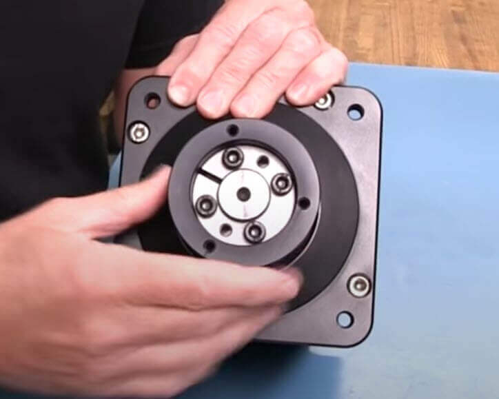 Simucube 2 Pro with SQR mount removed to reveal unique 3-hole mount