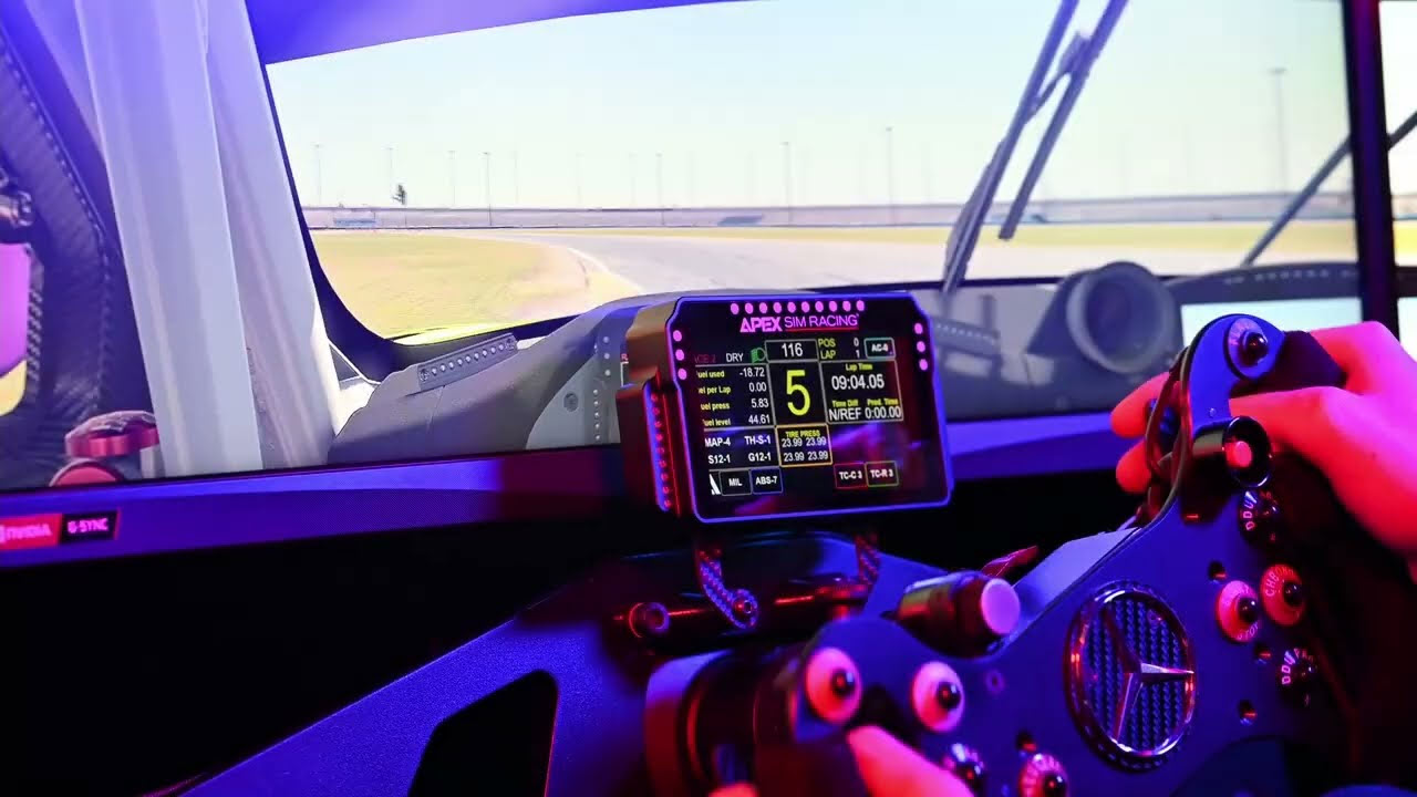 Apex Sim Racing GT3R DDU mounted behind a steering wheel in a sim rig