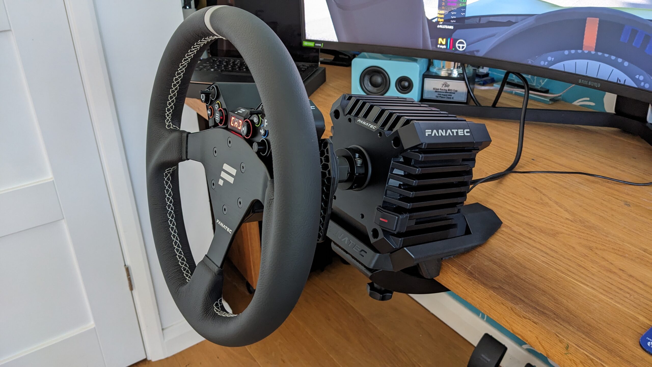 Fanatec CSL DD with a Fanatec wheel on a desk clamp