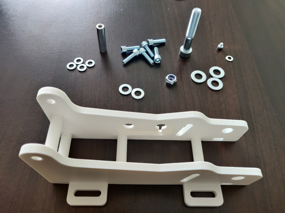 Array of 3D printed parts for sim racing build