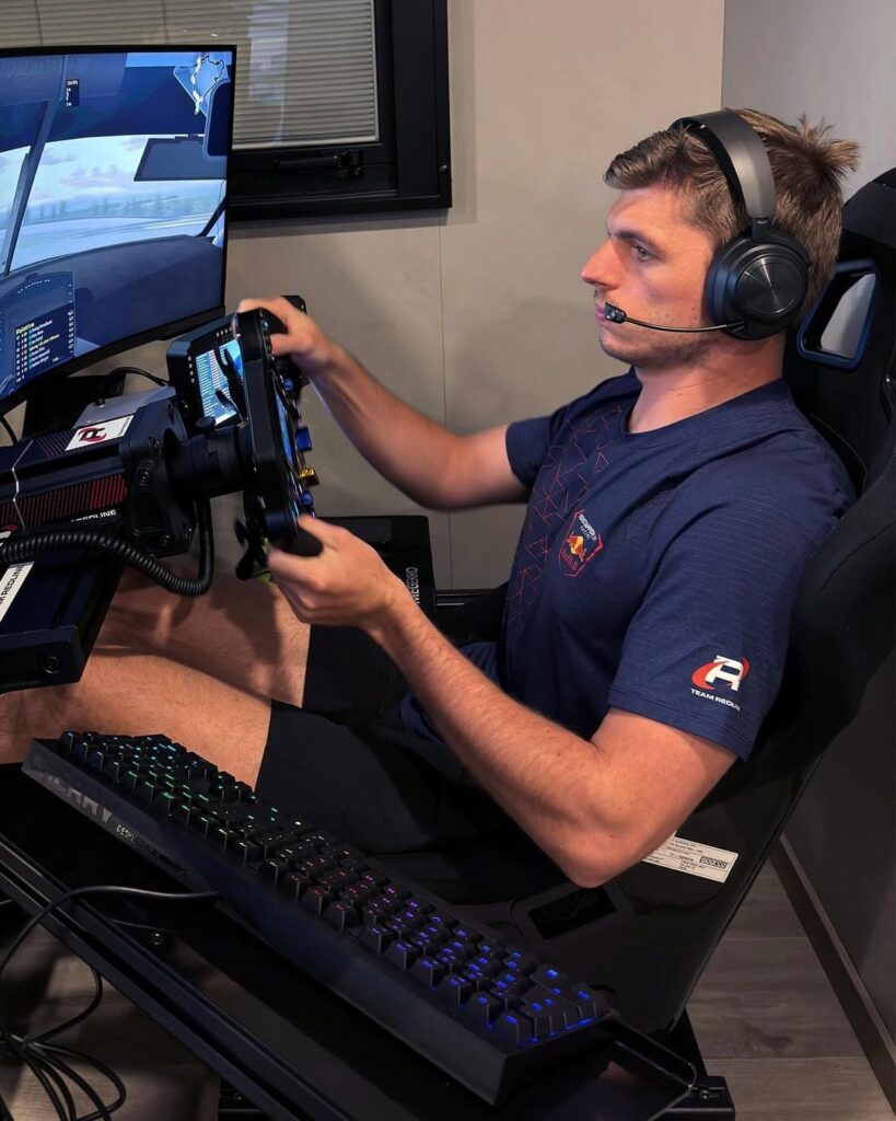 Max Verstappen in his "portable sim rig" during virtual Nurburgring 24 Hours at an F1 weekend at Imola.