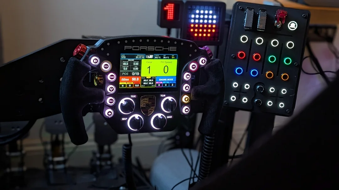 Pokornyi GTE wheel showing button layout and clutch paddles