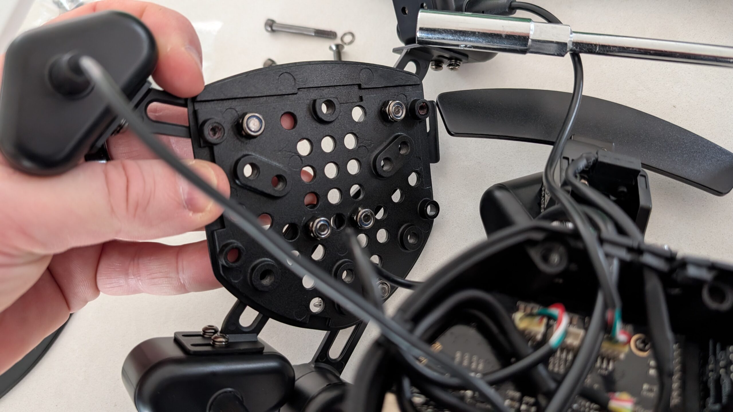 ClubSport Universal Hub V2 for Xbox with internals exposed during assembly showing button PCBs and ribbon cables