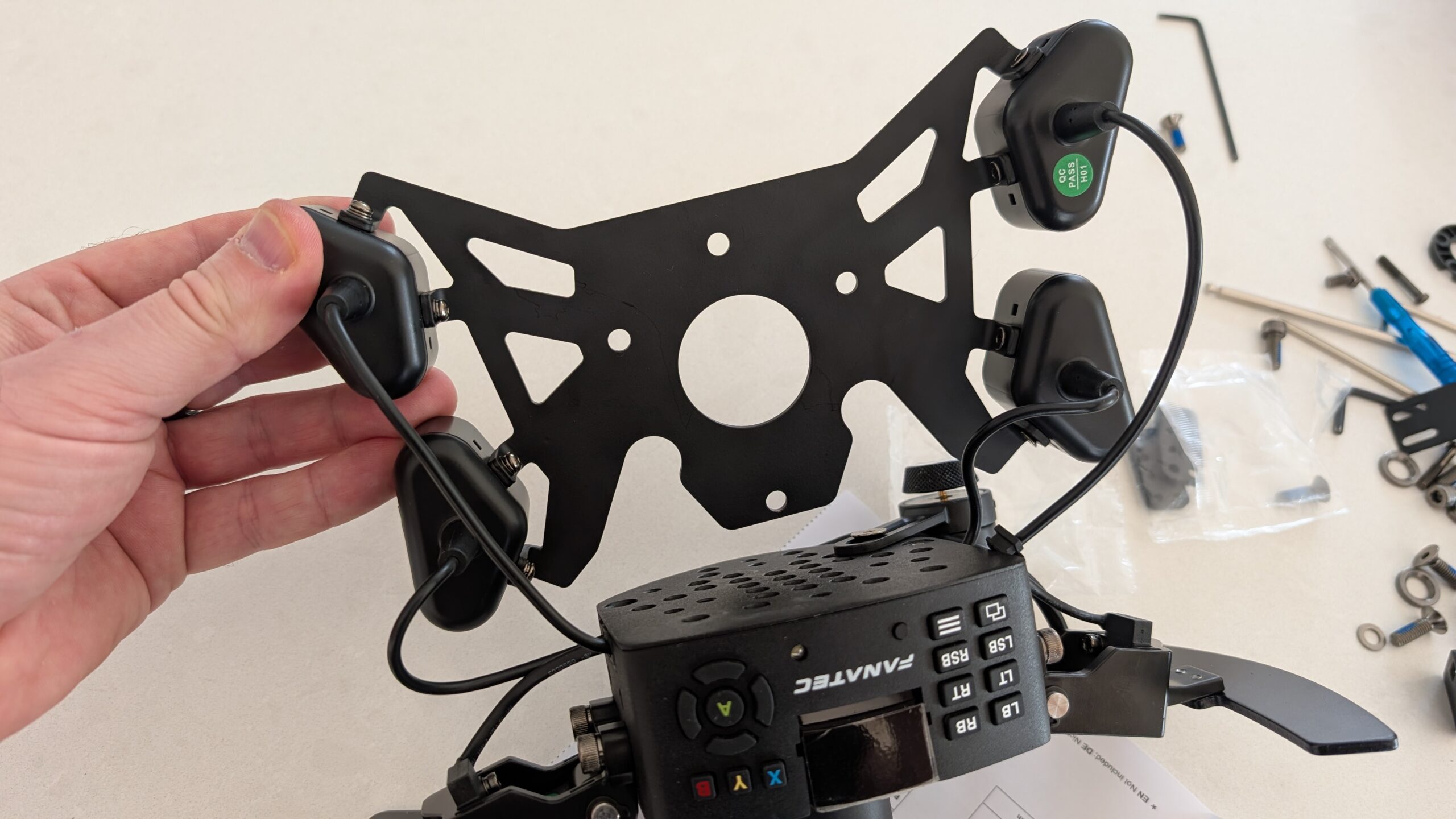 Buttons mounted on the GT3 adapter plate ready for rim attachment