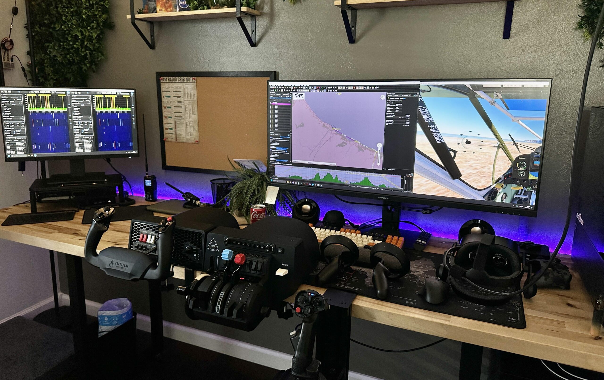 Home flight simulator cockpit setup with throttle quadrant centre-foreground, yoke, dual ultrawide monitor displays running Microsoft Flight Simulator, mixed HOTAS controls, purple LED backlighting
