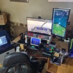Home flight simulator GA cockpit setup with yoke centred in foreground, throttle quadrant to the right, dual monitor MSFS with Cessna cockpit, navigation map on second screen