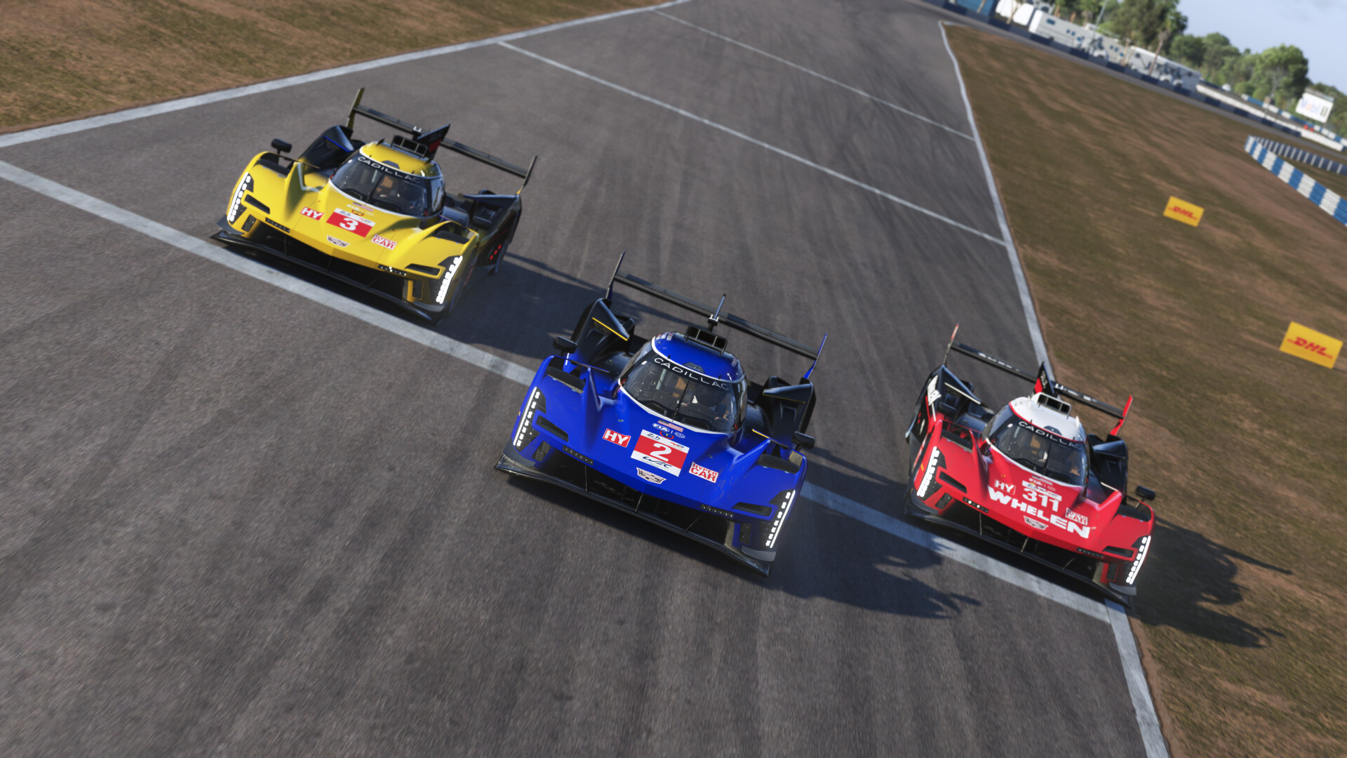 Three Le Mans Ultimate Hypercars running three-wide through a corner