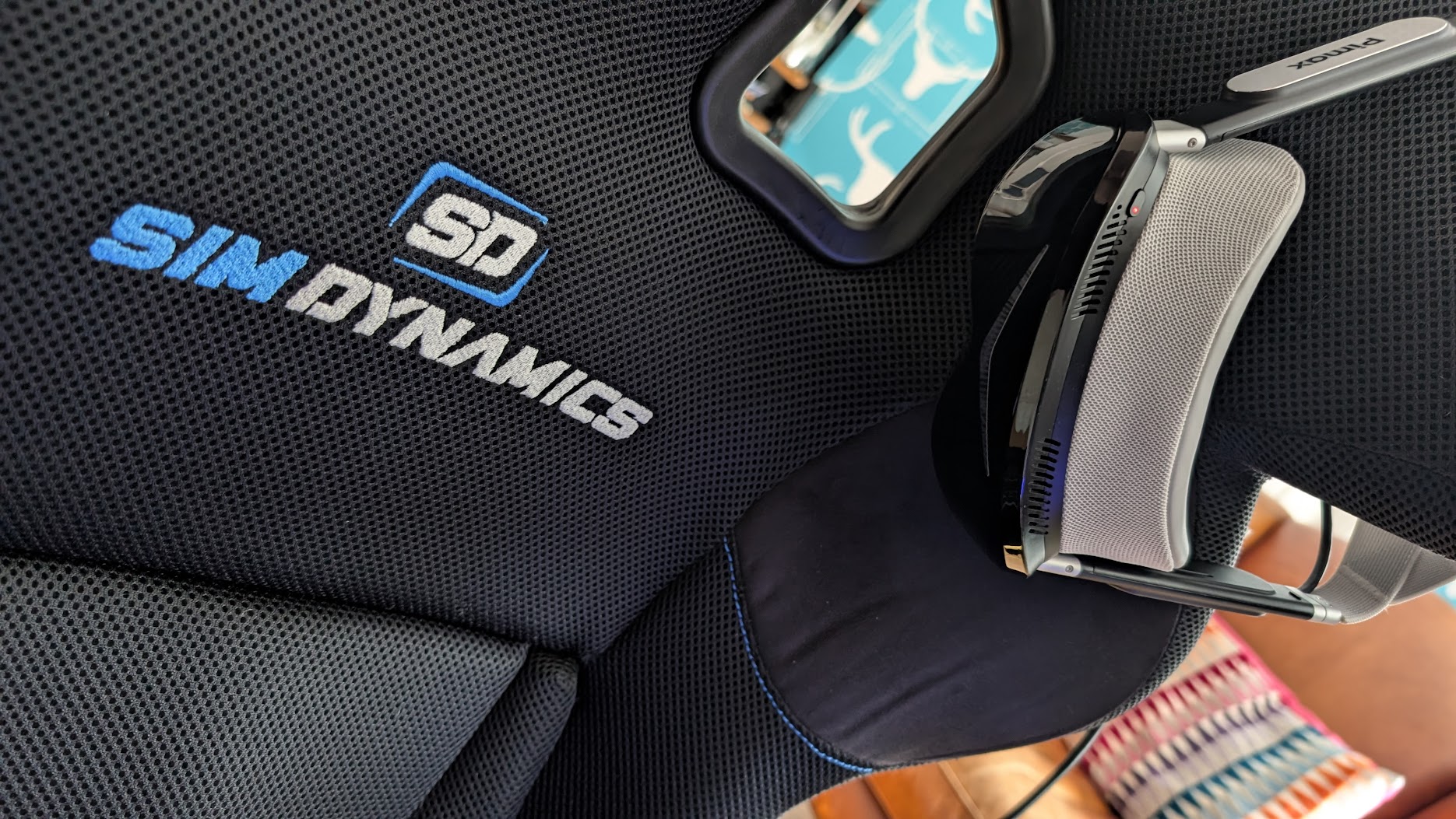 Pimax Dream Air hanging on a Sim Dynamics race seat