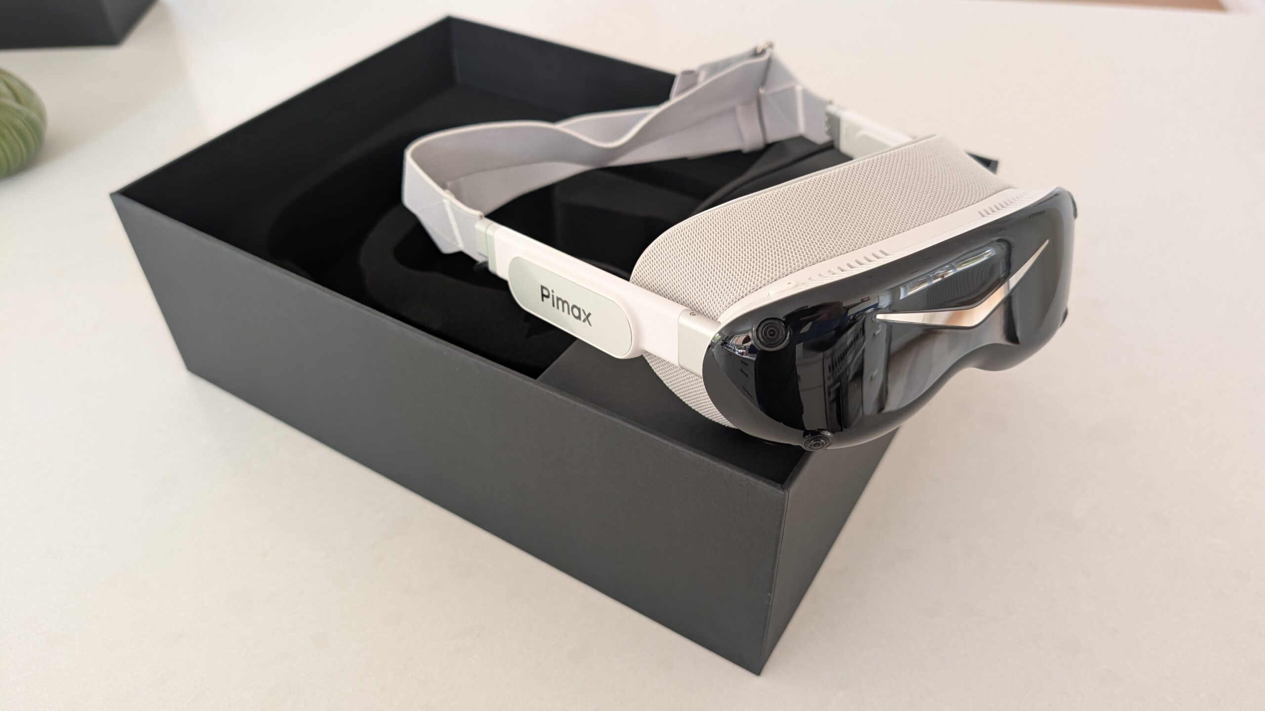 Close-up of the Pimax Dream Air SLAM front camera on the visor edge