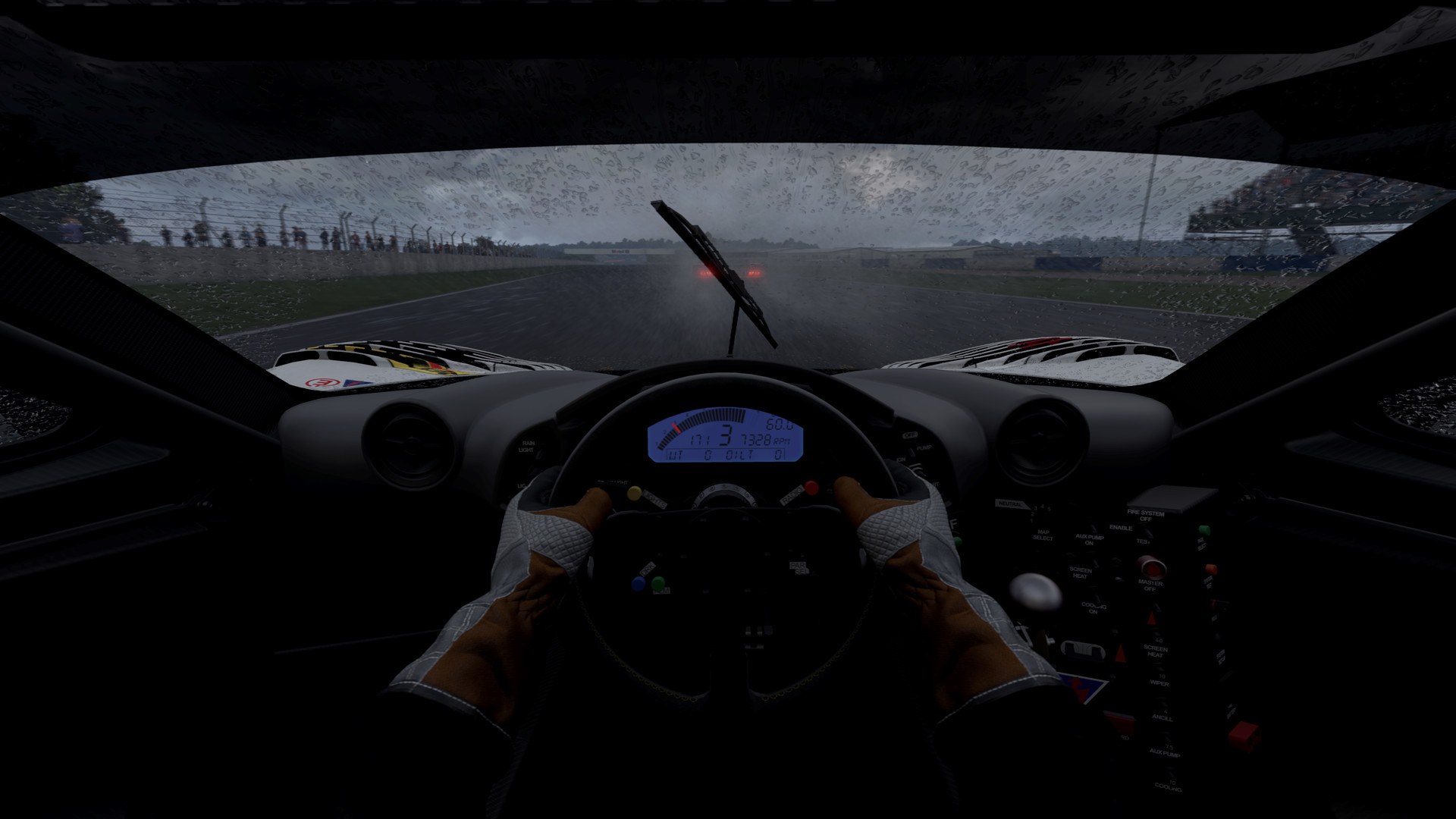 Wet-weather cockpit view in Automobilista 2 with the driver's hands on the steering wheel