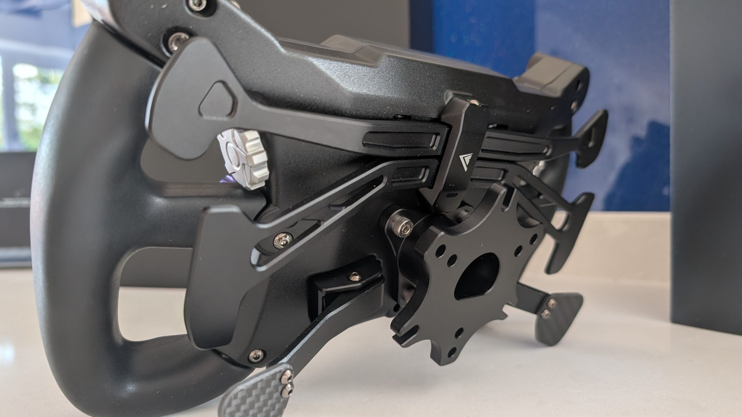 Rear of the Conspit 290 GP showing the magnetic shifter and clutch paddles