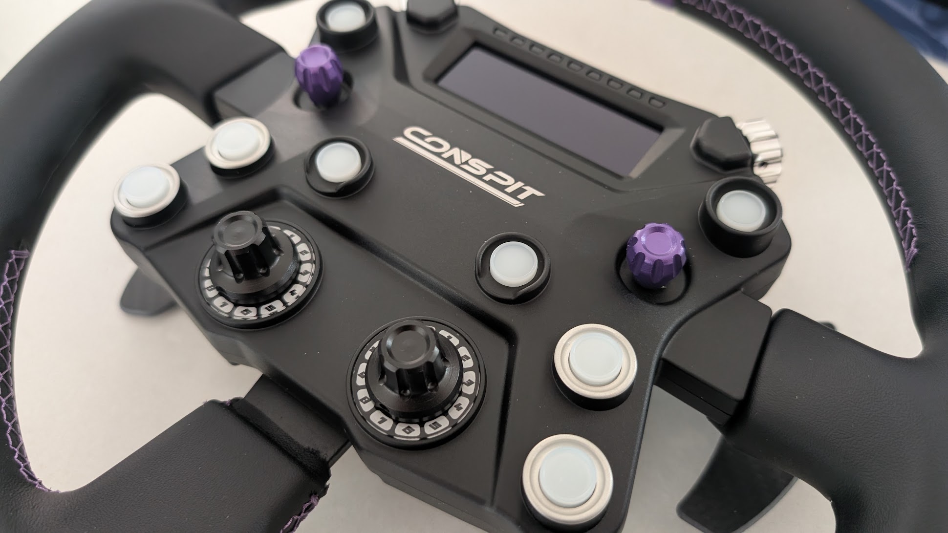 Conspit 310 APEX button box from the other side: screen, LED row, second encoder and both rotary switches