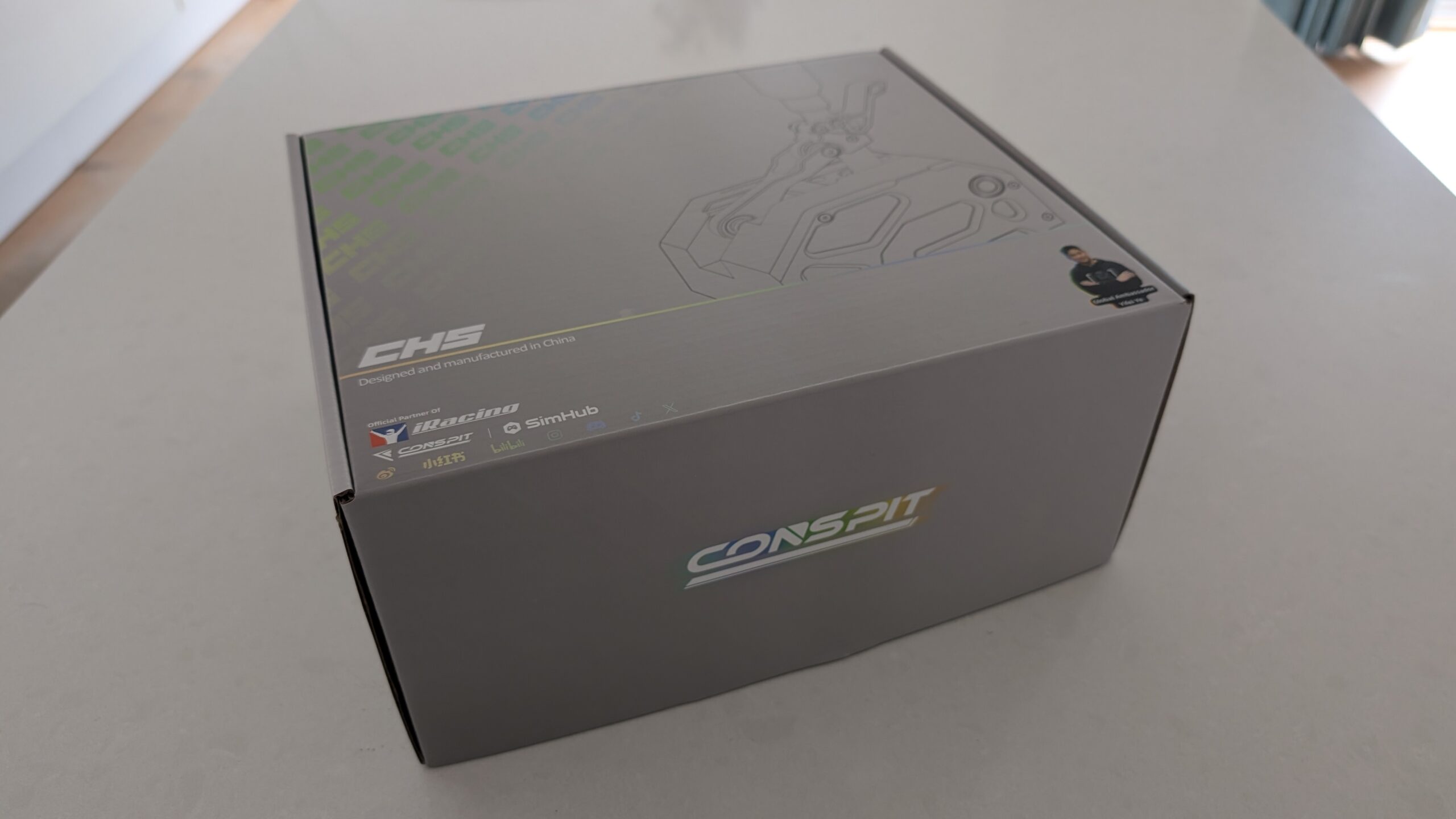 CONSPIT CHS retail box with printed line art of the shifter