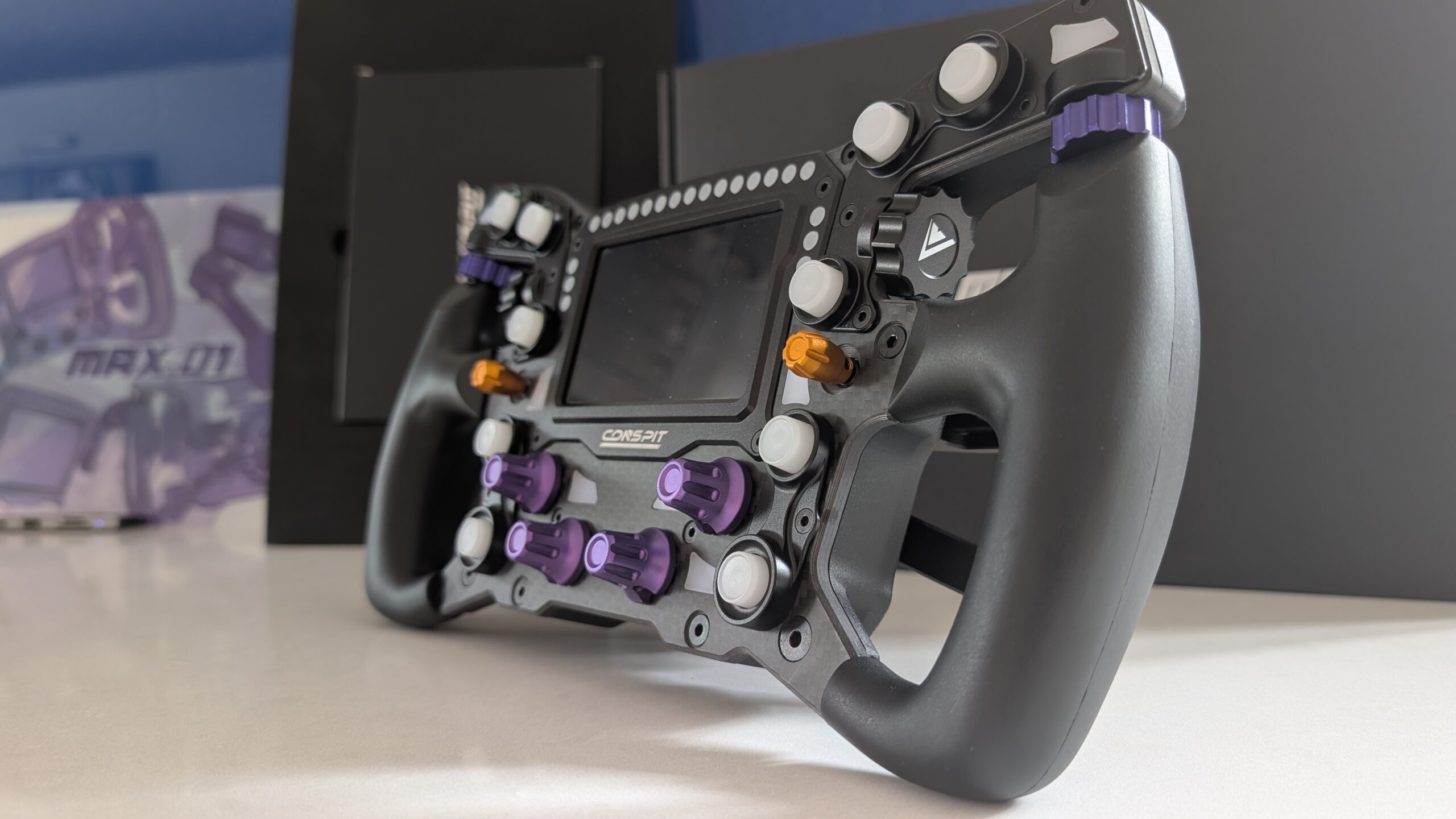 Conspit Max 01 formula wheel, front three-quarter view