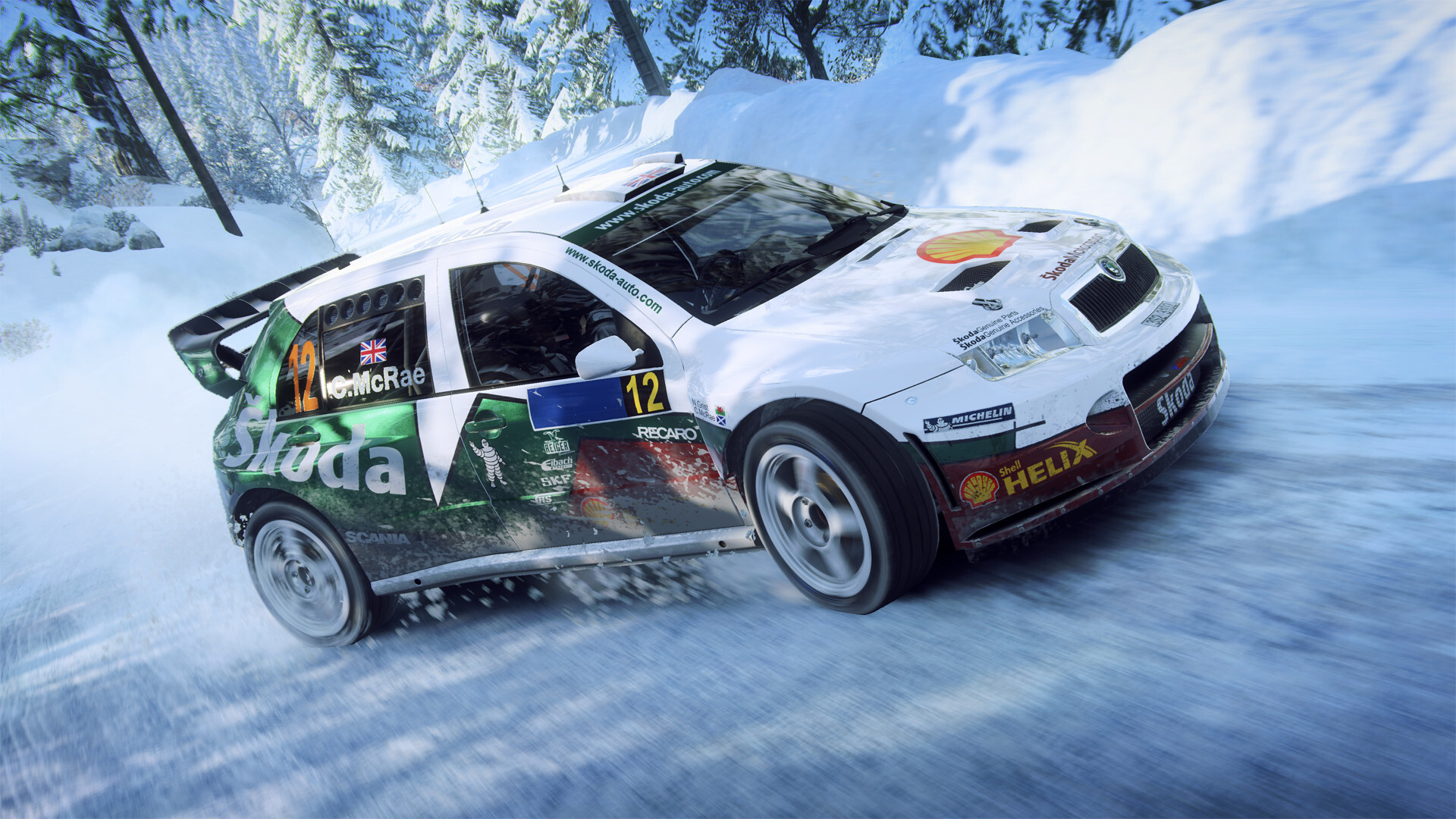 White and green Skoda Fabia WRC rally car on a snowy forest stage in DiRT Rally 2.0