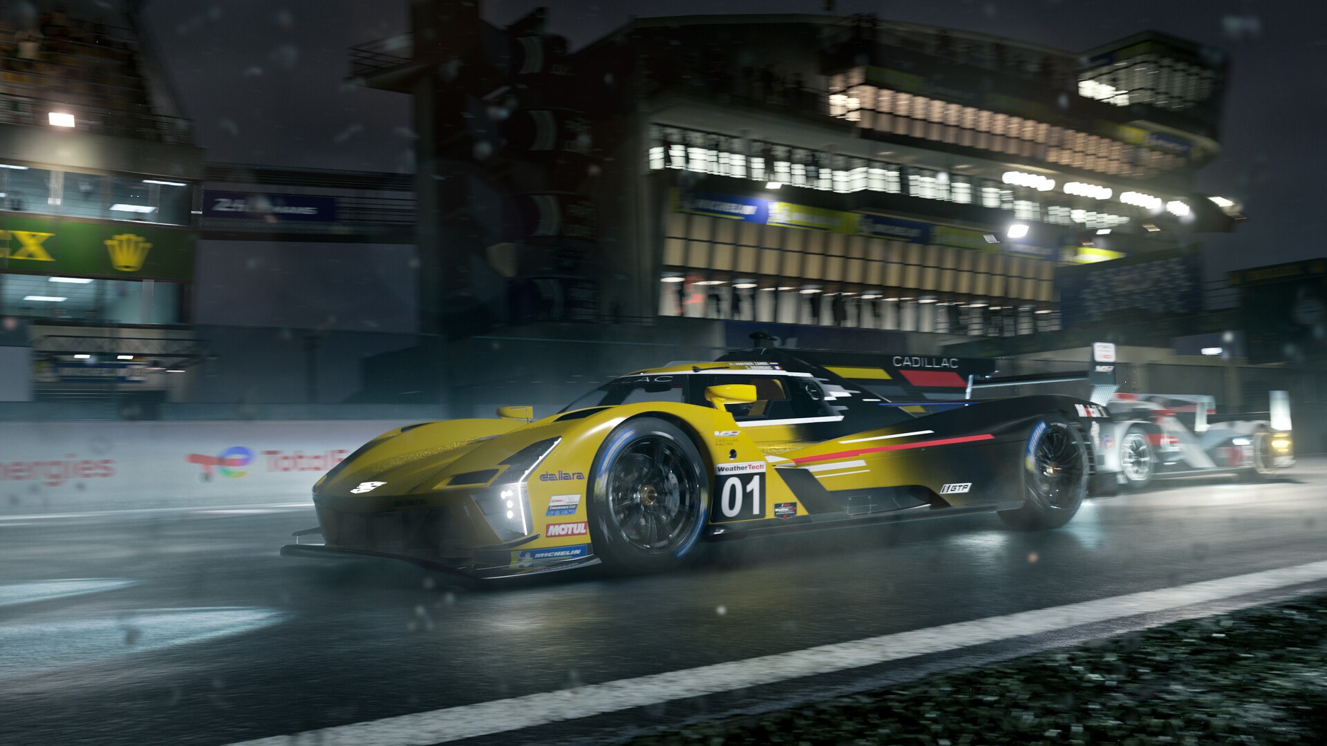 A Cadillac GTP prototype on the Le Mans pit straight at night in Forza Motorsport