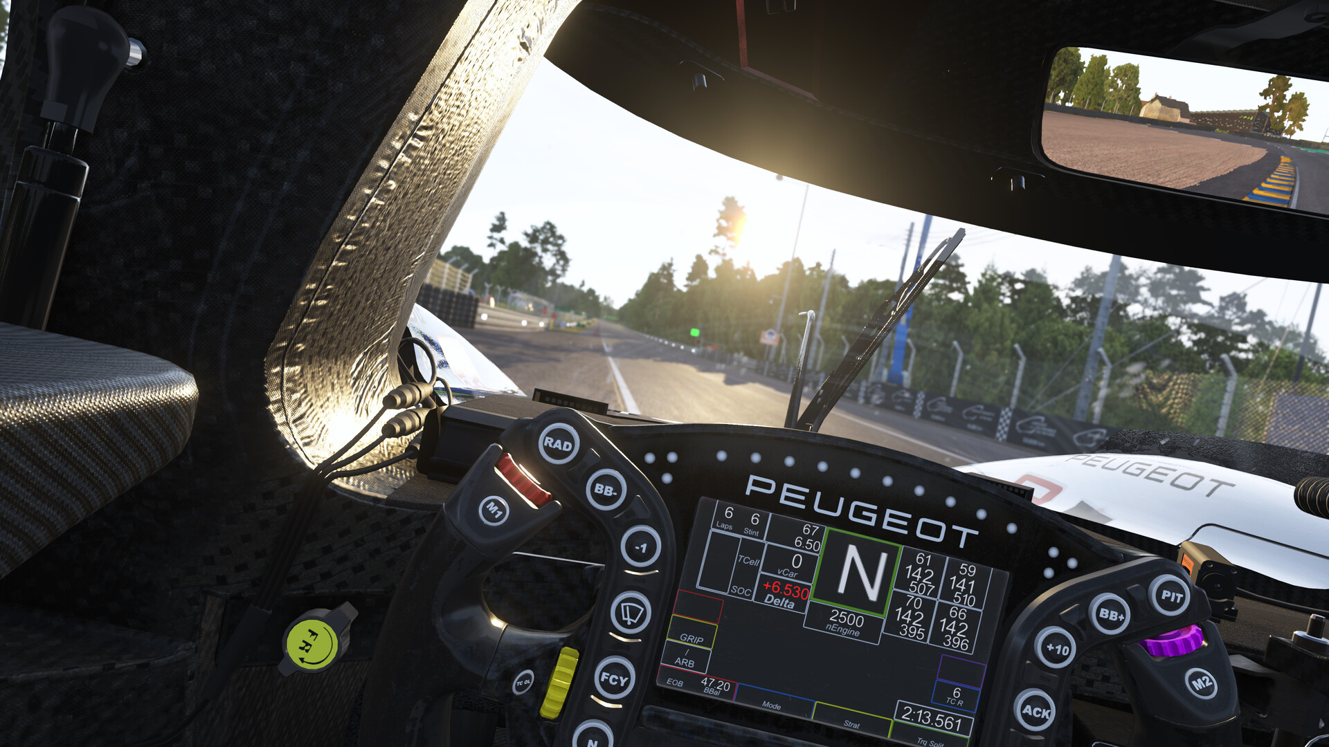 Peugeot 9X8 steering wheel and dash from the cockpit in Le Mans Ultimate
