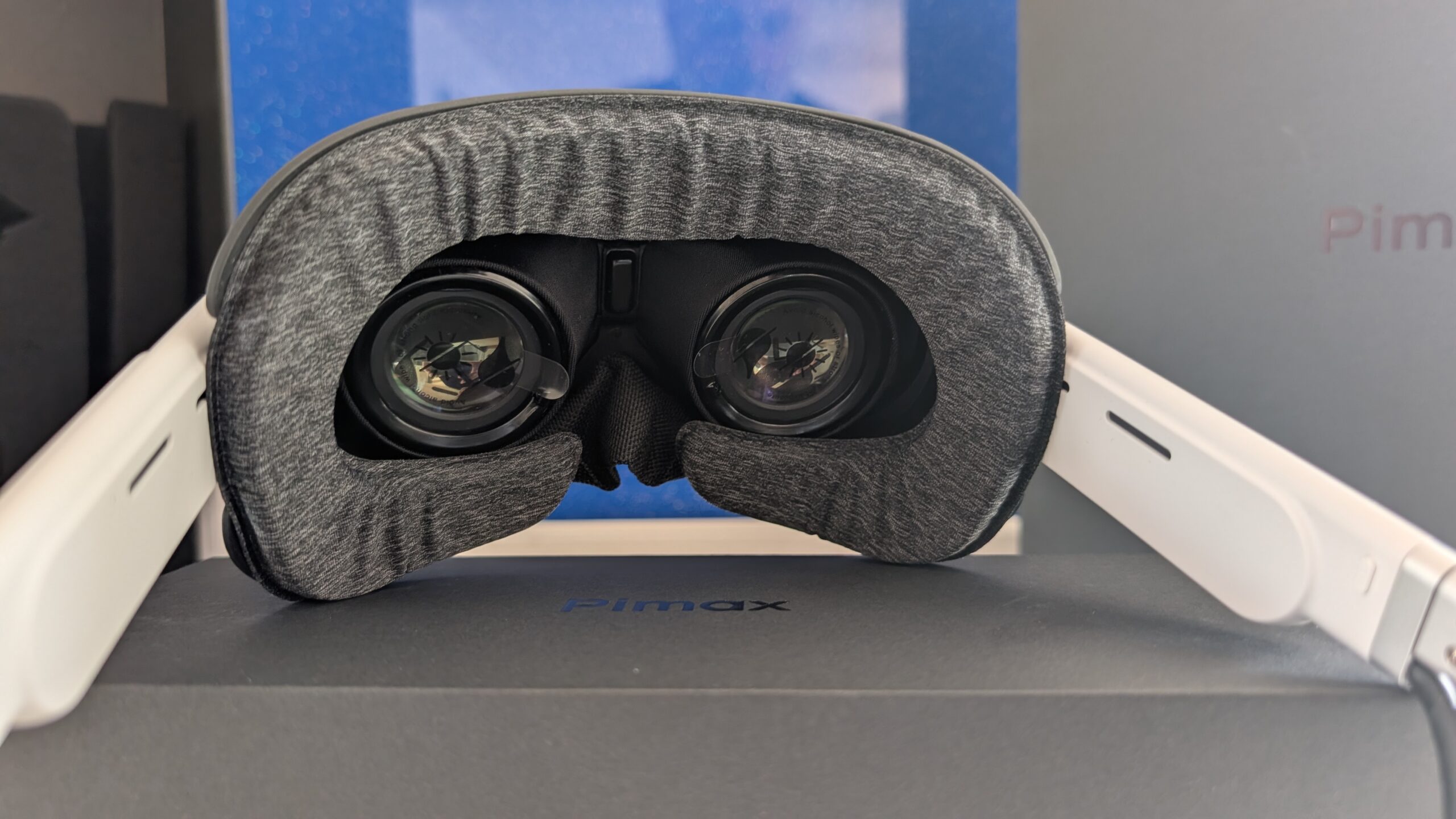 Close view inside the Pimax Dream Air SE showing two pancake lenses and the grey fabric facial interface