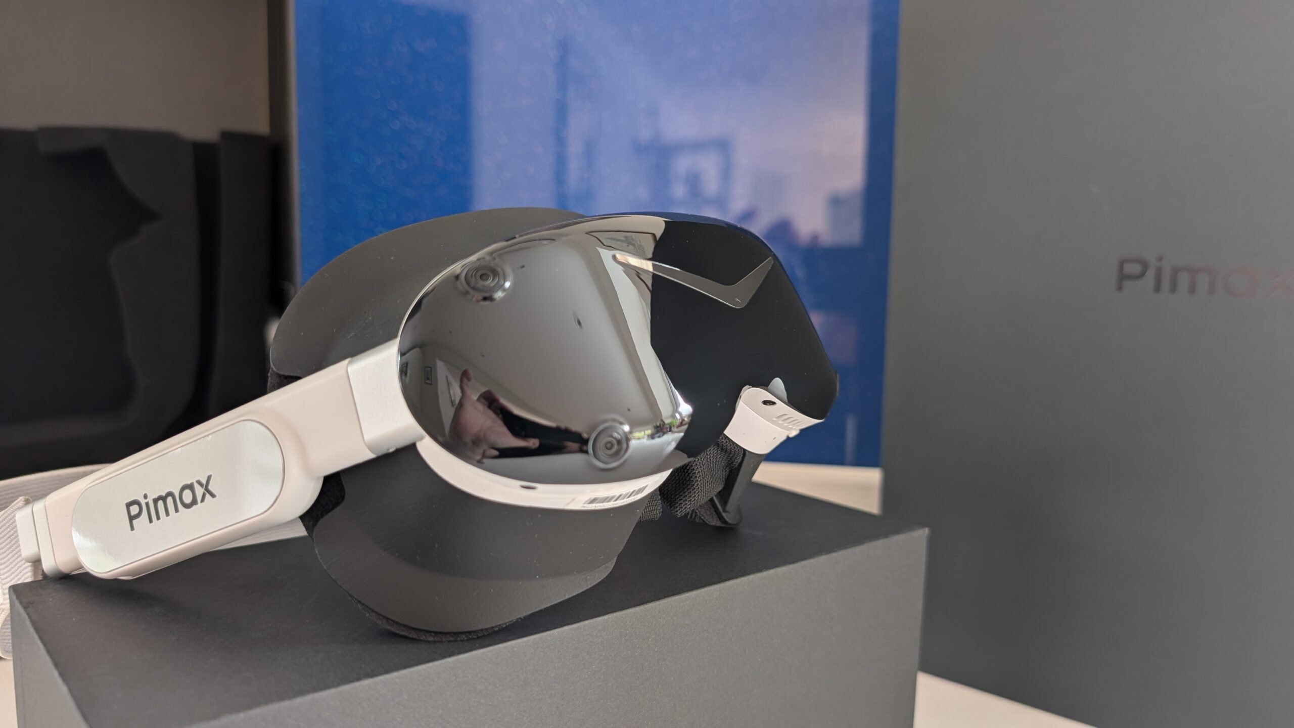 Angled view of the Dream Air SE showing the mirrored visor and two of the four onboard SLAM tracking cameras