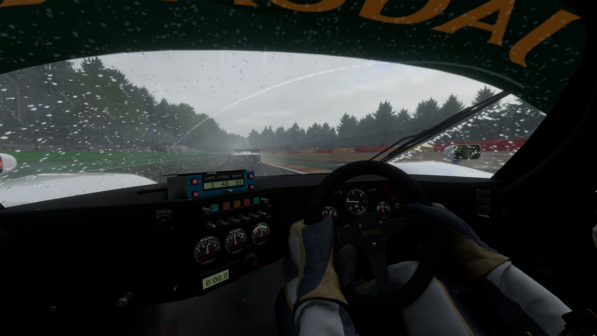 Driver's-eye cockpit view of a race car in the rain in Project Motor Racing