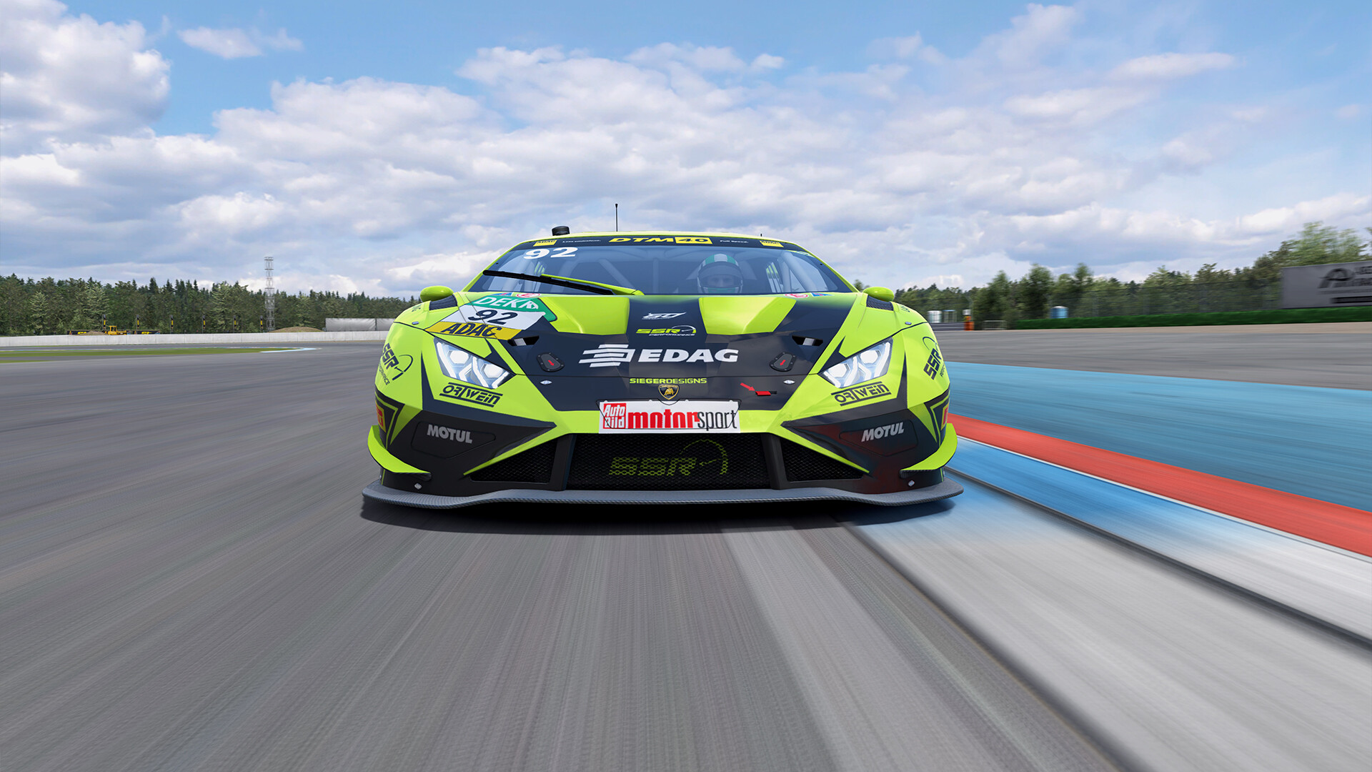 Lamborghini GT3 car running alongside a kerb in RaceRoom Racing Experience
