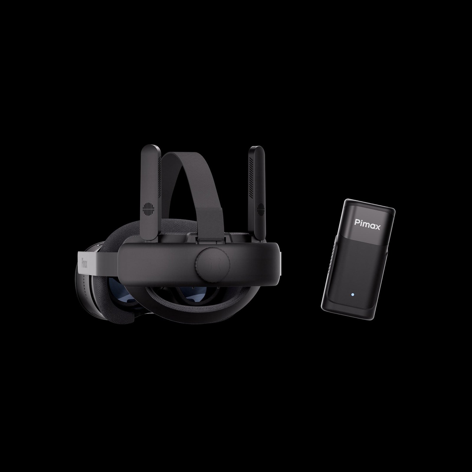 Pimax Crystal Pro from behind with two antennas on the head strap, next to a Pimax-branded 60G AirLink unit