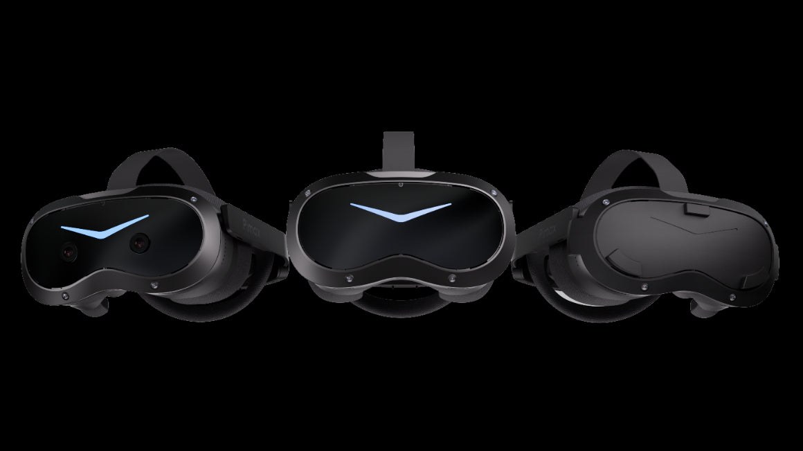 Three Pimax Crystal Pro headsets side by side, each fitted with a different faceplate